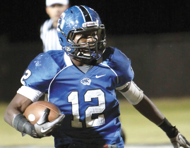 Michael Clements/The Times -- James Wilson ran for 174 yards and two touchdowns on 21 carries Thursday night.