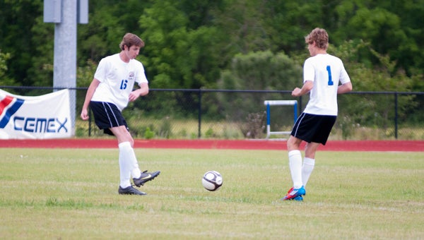 Austin Brooks and Adam Brooker kick off for Demopolis after Moody scored in the opening minutes of the playoff game held Tuesday night. The Tigers fell 4-1.