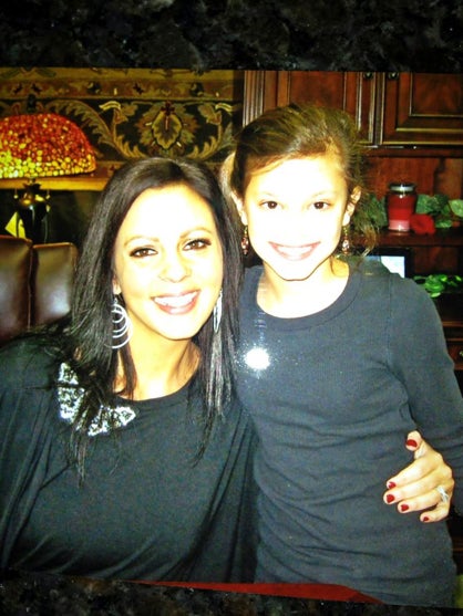 Tutt with country music star Sara Evans. 