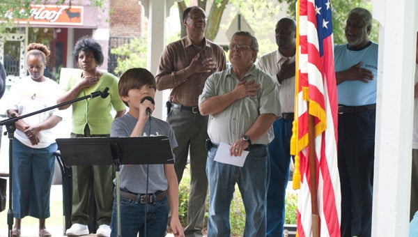 Jones Colgrove opened the National Day of Prayer ceremony in Demopolis with the national anthem.