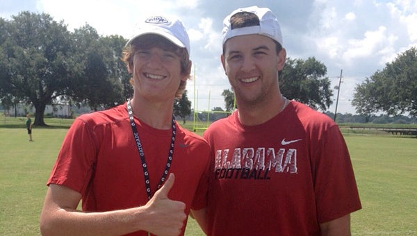 Tripp Perry, junior quarterback at Demopolis High School, attended the Manning Passing Academy in Thibodaux, La. He received instruction from AJ McCarron (right) and other quarterbacks and coaches during the camp.