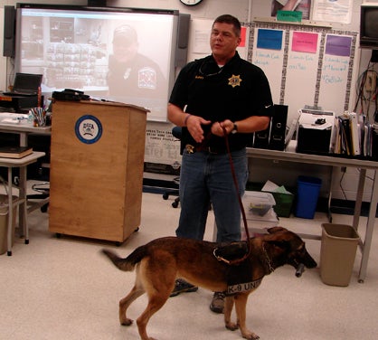 Agent Robbie Autery and his K-9 Suza held a demonstration during their visit to DHS Wednesday.