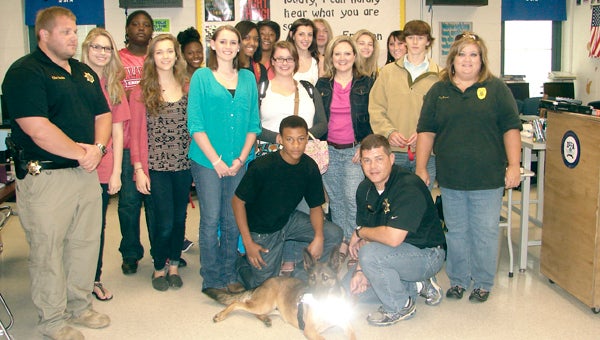 Commander Clint Sumlin, agent Robbie Autery, Lisa Anderson and Suza from the 17th Judicial Drug Task Force visited Connie Davis' law and society class at Demopolis High School on Wednesday.