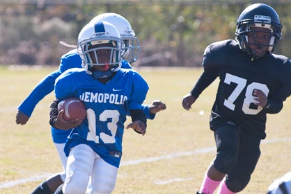Mason James scored the only touchdown of the morning for the Demopolis 7/8 year olds.