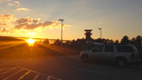 The sun sets Saturday, Oct. 19 behind Donaldson Correctional Facility in Jefferson County.