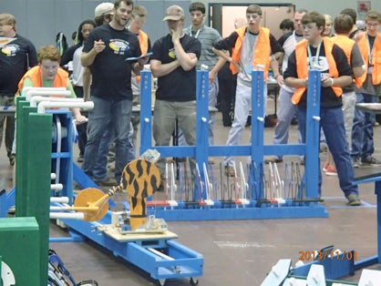 The DMS Robotics Team had to build a robot that picked up and placed items in specific places during the competition.
