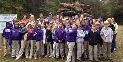 Fifth-grade students from Sweet Water High School had the opportunity to learn about Alabama’s forestland in the 4-H “Classroom in the Forest” program. They are shown at landowner Roy Jordan’s property in Nanafalia.
