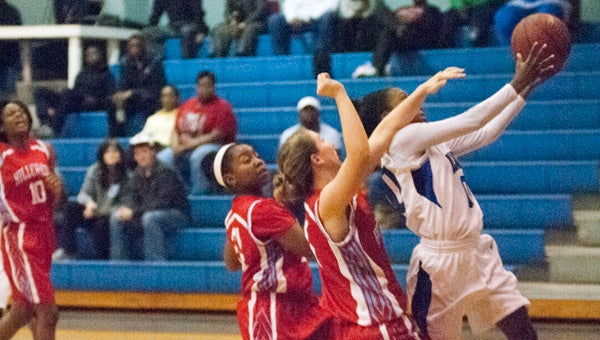 Erica Bennett goes up for a layup for Demopolis High School in Monday night's game against Hillcrest-Tuscaloosa.