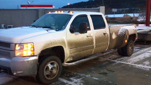 Dusty Smith's truck was covered in ice by the time he got to Irondale, where he spent Tuesday night in the truck.