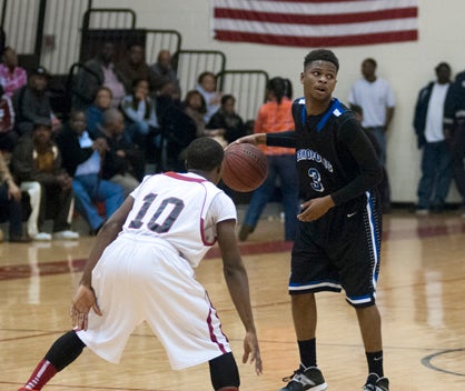 Kiante Jefferies brings the ball up the court for Demopolis.