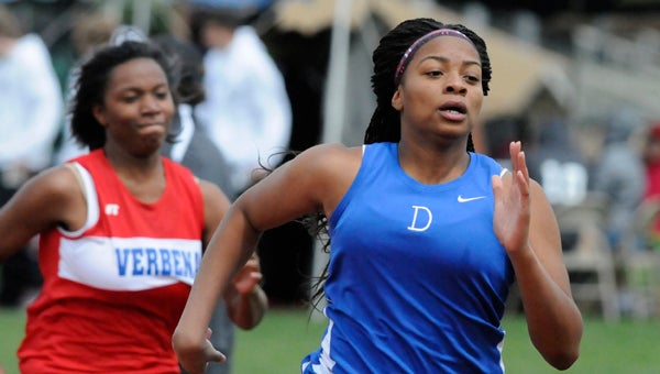  Ivery Moore runs in Tuesday’s Dallas County High School Invitational at Selma’s Memorial Stadium.