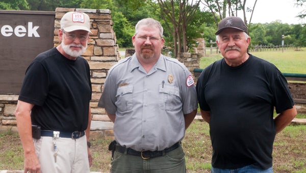 Foscue Park volunteer James Wade, Park Ranger Harvey Hawkins and volunteer Harris Channell work together to keep Foscue Park a safe, clean park.