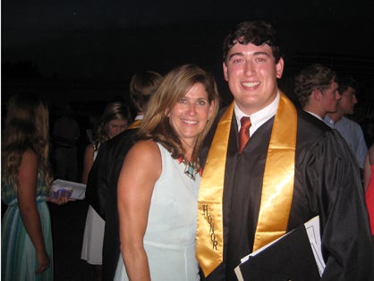 Marengo Academy honors graduate William Tutt with his mother, Jill.