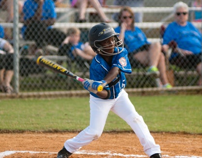 Chris Battey takes a swing for Demopolis in Monday night's 8U All-Star game.
