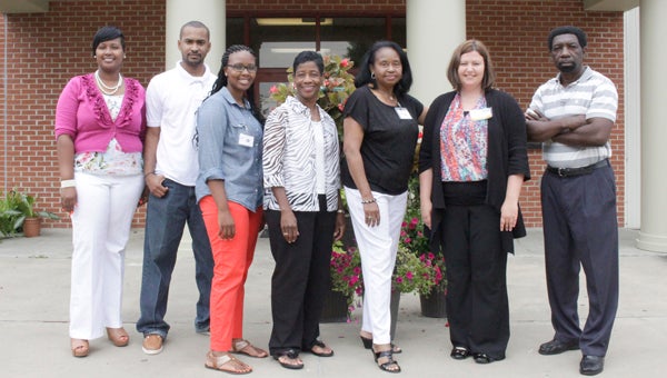 From left to right are Bridget Glover with Theo Ratliff Center; volunteers Antonio Bryant, Clarietta Agee, Carolyn Moore, Hester M. Brown, Kathryn Pearson and Ed Ward, Ratliff Center’s director.