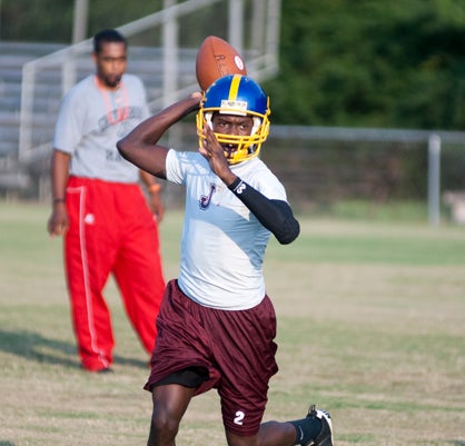 ALJ quarterback Zynell McGee finds an open receiver.