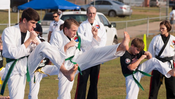 The Ross Martial Arts fight team held a demonstration during Tuesday's National Night Out event at the Demopolis Middle School football field.