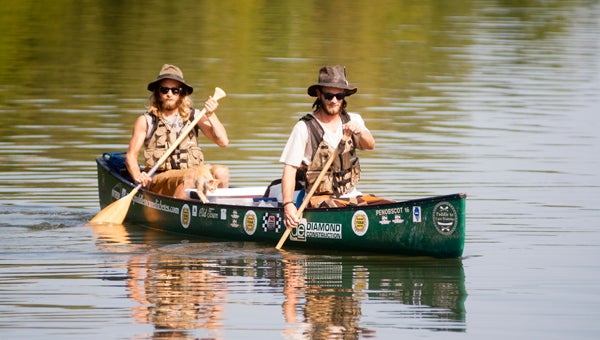 Peter Stadalsky, Nolan McClelland and Tom, their cat, are canoeing from Bryson City, N.C., to Mobile during their "Paddle to Cure Diabetes." Their goal is to raise $10,000 for the American Diabetes Association.