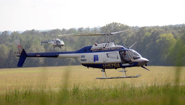     Multiple law enforcement agencies from Alabama, Mississippi and South Carolina, along with the Federal Bureau of Investigations took part in Tuesday’s search, which covered a 50-mile area from Butler County to Wilcox County. (Advocate Staff/Andy Brown)