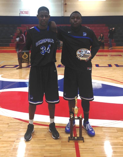 Charles Tripp, left, was named to the all-tournament team, and Josh Moore was named the Tournament MVP.