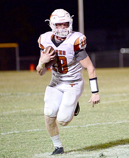 Hayden Huckabee looks for some space on the edge in a 35-12 victory over Abbeville Christian. 