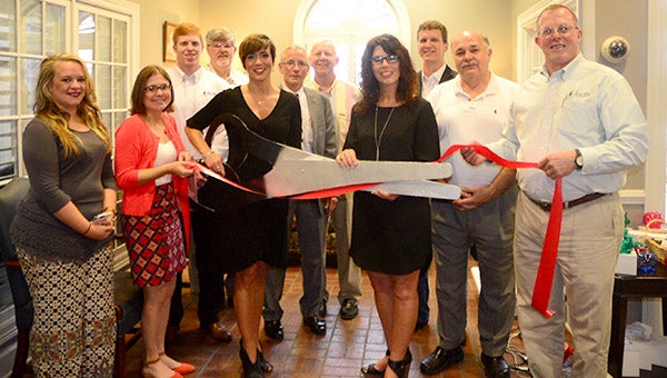 Members of the County Commission as well as representatives of Sweet Water Bank were on hand for the ribbon cutting ceremony at the kiosk in the Demopolis Branch of the Sweet Water Branch. Pictured left to right: Caitlyn Bamarger, Demopolis Chamber of Commerce Executive Director Ashley Coplin, Jacob Kerby, Kenny Freeman, Marengo County Probate Judge Laurie Hall, District 2 Commissioner Dan England, Marengo County Revenue Commissioner Sharon Barkley, Mike Grayson, and Olen Kerby.