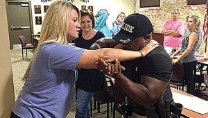 Erin Dixon learns self defense techniques from Sgt. Richard “Tank” Bryant during the fall 2015 Citizens Police Academy session.