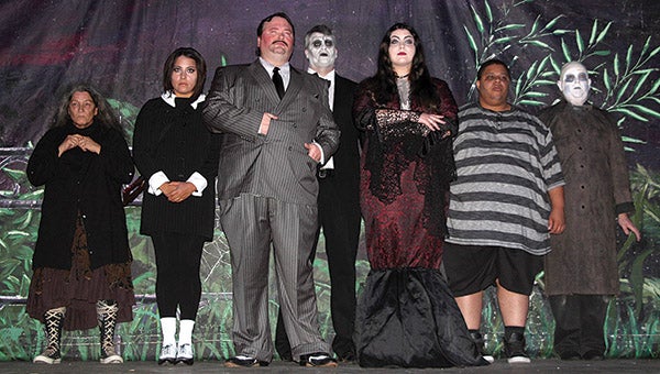 The Canebrake Players are bringing the television classic, “The Addams Family,” to its stage this weekend. The roles of the family are played by, from left, Susanna Naisbett, Brittany Anne Lowe, Dylan Daniels, Brad Daniels, Catherine Akins, Nicholas Finch,  and James Robinson.