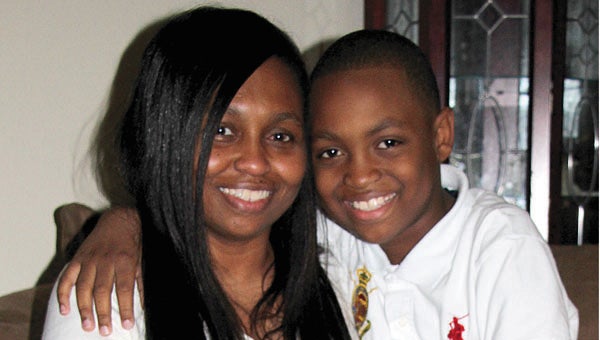 Christian Walls, now 9, with his mother Sanyvette Hill. Christian was diagnosed with a Wilms tumor in the spring of 2015 and just recently completed weekly chemotherapy treatments at Children’s Hospital in Birmingham.